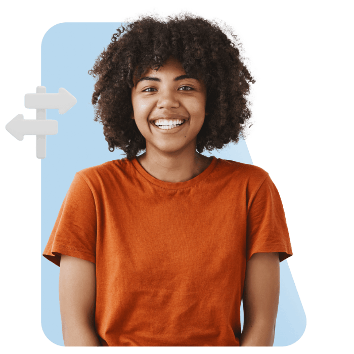 Smiling person with curly hair in an orange shirt, standing against a blue background with white arrow icons, conveying joy and optimism.