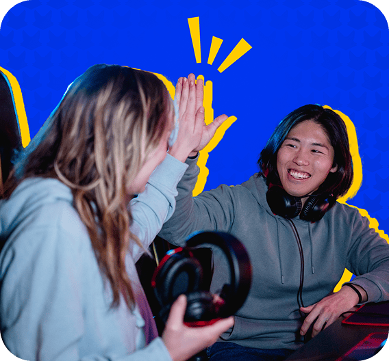Two people enthusiastically high-five in front of bright blue and yellow background, wearing headphones. The atmosphere is joyful and celebratory.
